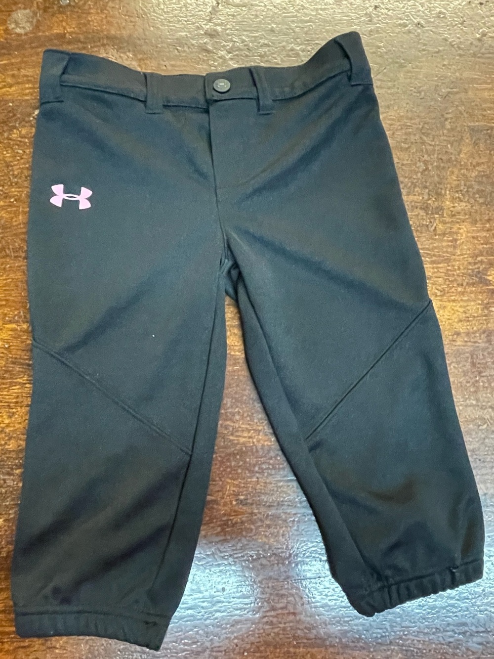 Under Armour Kids' Black Softball pants, knicker style with Pink Logo